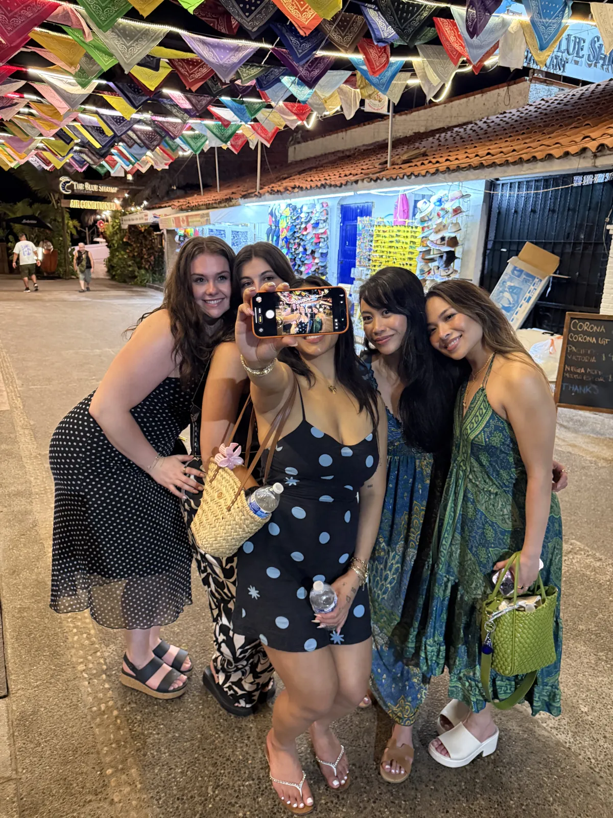 Friends exploring a colourful street in Puerto Vallarta
