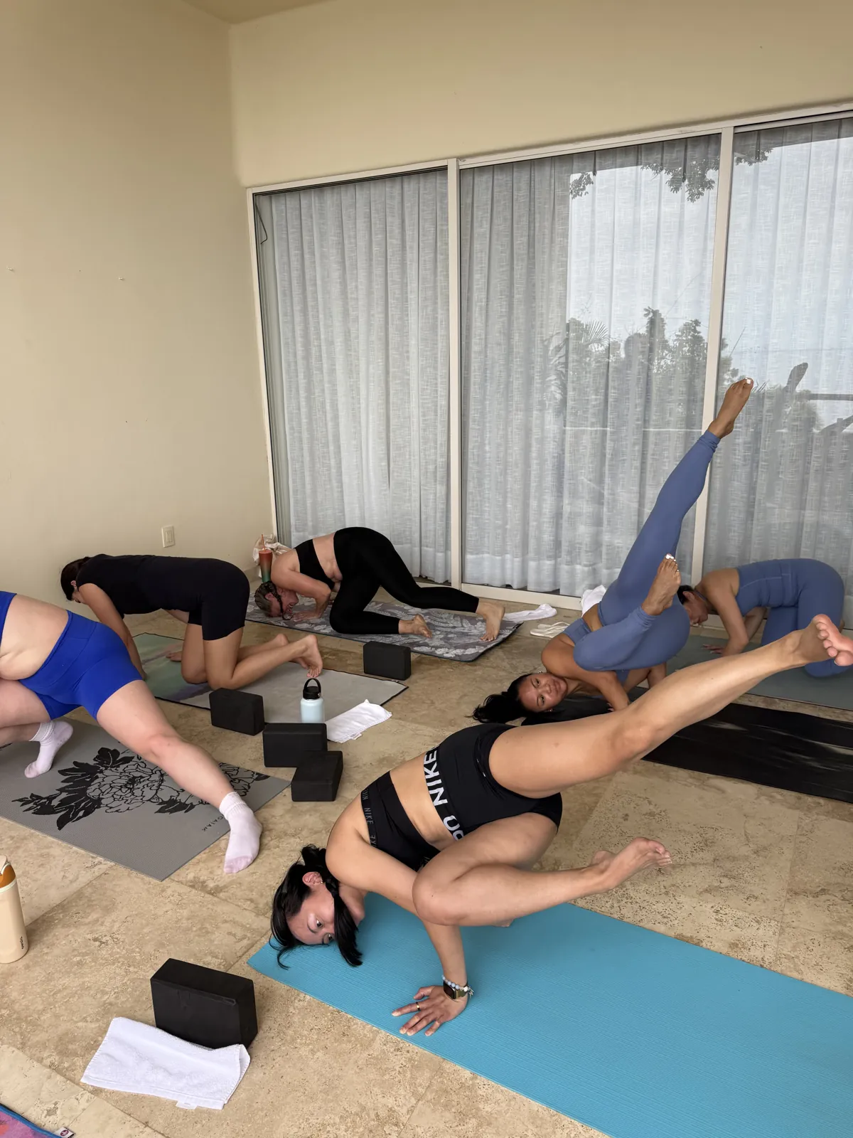 Partner stretching during a Pilates class